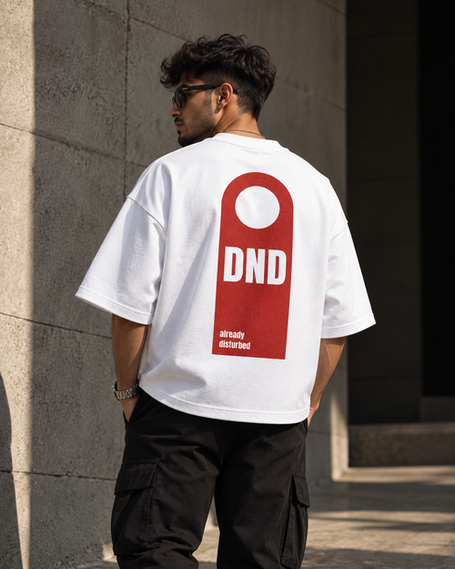 White DND oversized t-shirt back view featuring DND already disturbed door hanger graphic