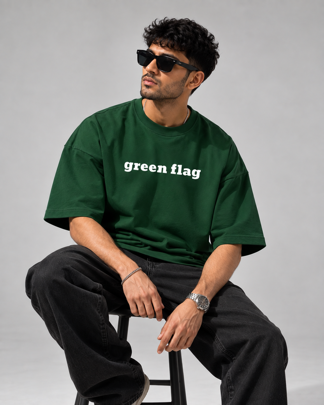 Bottle-Green Flag Premium Oversized T-Shirt lifestyle view with green flag typography
