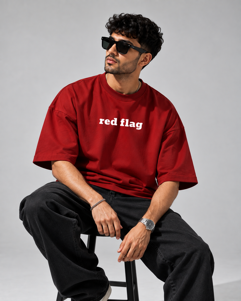 Red Red Flag Premium Oversized T-Shirt lifestyle view with red flag typography