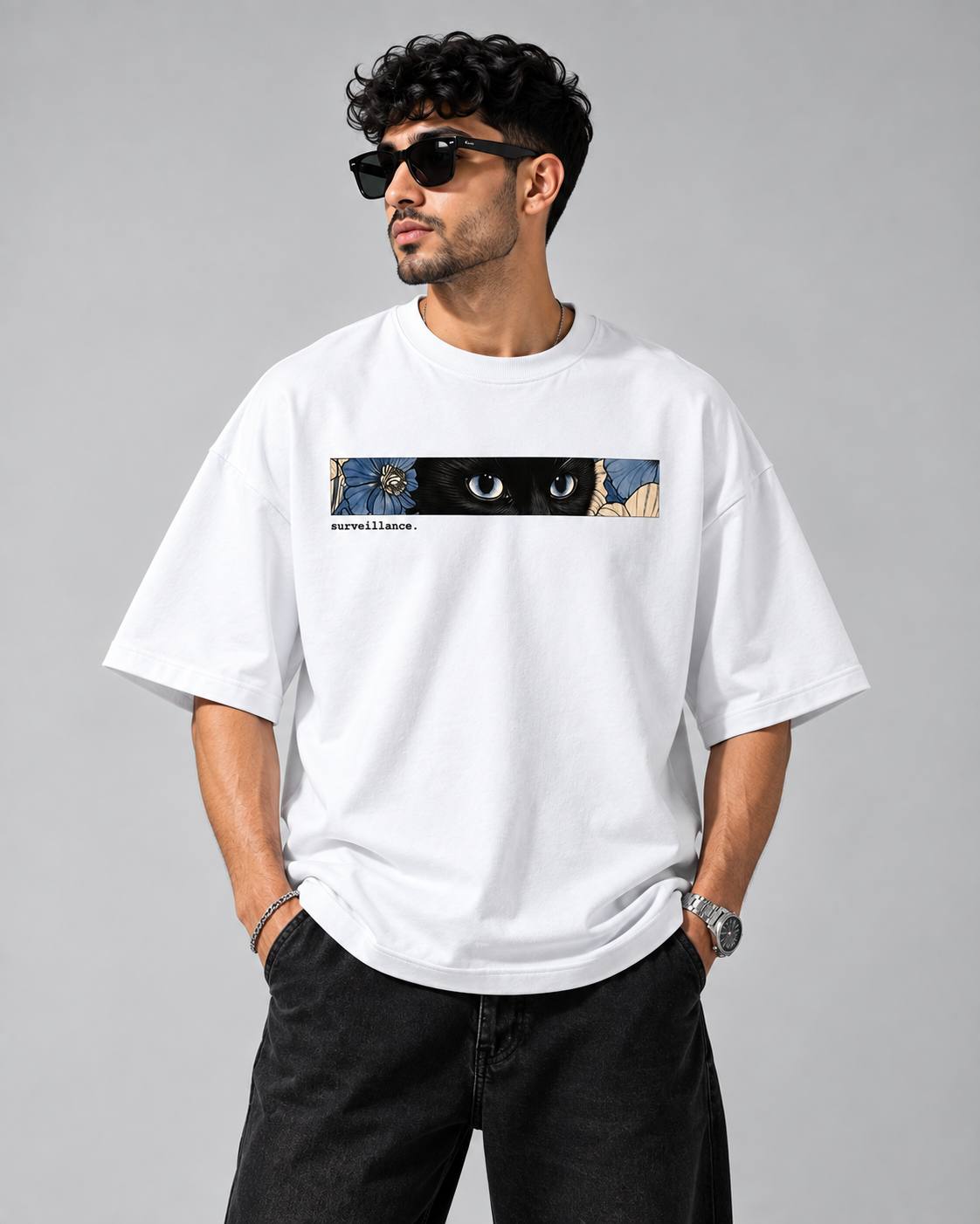 White Surveillance Premium Oversized T-Shirt front view with blue floral eye graphic and surveillance typography